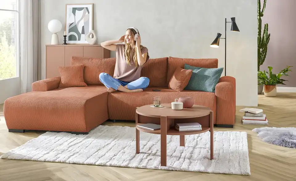 Ecksofa Nelly mit Schlaffunktion, in Wohnsituation