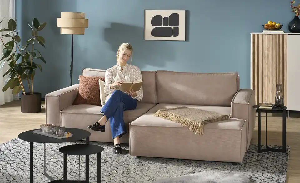 Ecksofa Capri mit Schlaffunktion, in Wohnsituation