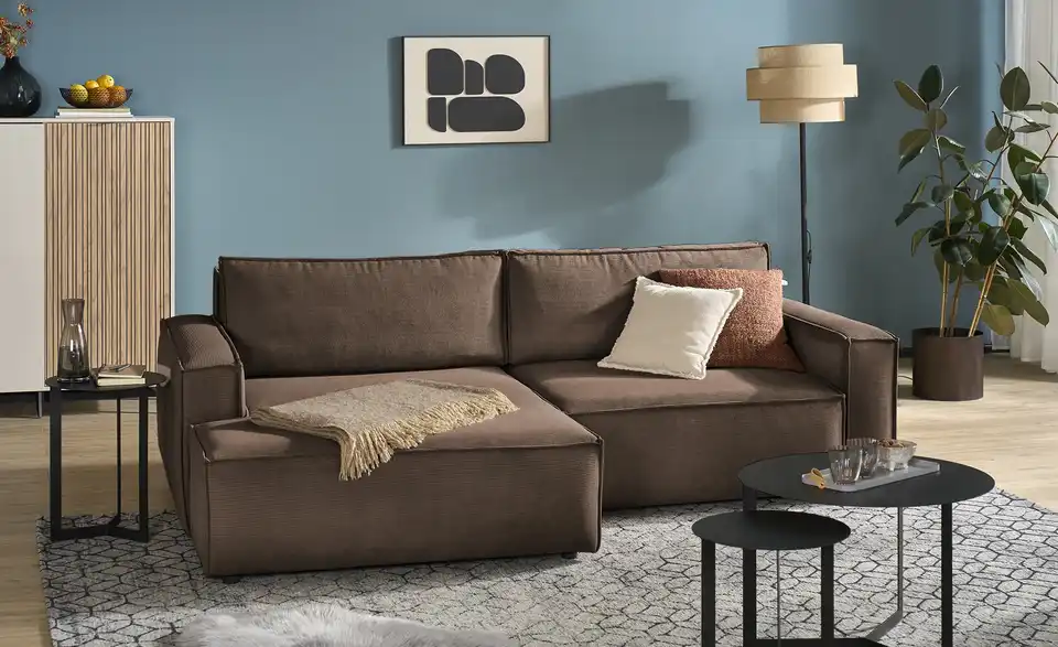 Ecksofa Capri mit Schlaffunktion, in Wohnsituation