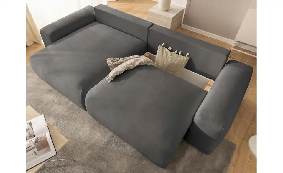 S-STYLE Ecksofa Puffy mit Schlaffunktion, in Wohnsituation