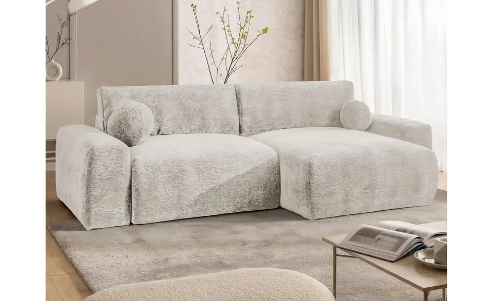 S-STYLE Ecksofa Puffy mit Schlaffunktion, in Wohnsituation