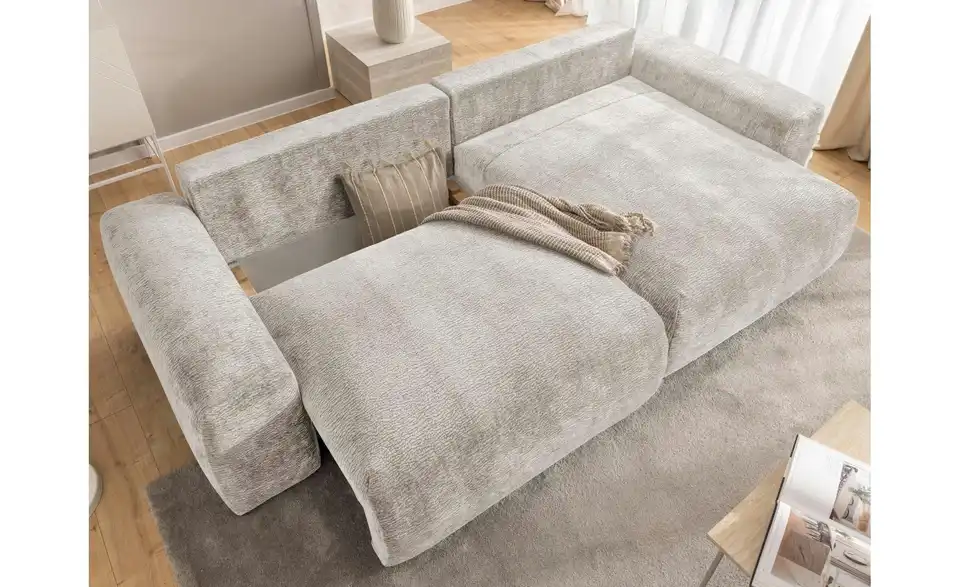 S-STYLE Ecksofa Puffy mit Schlaffunktion, in Wohnsituation