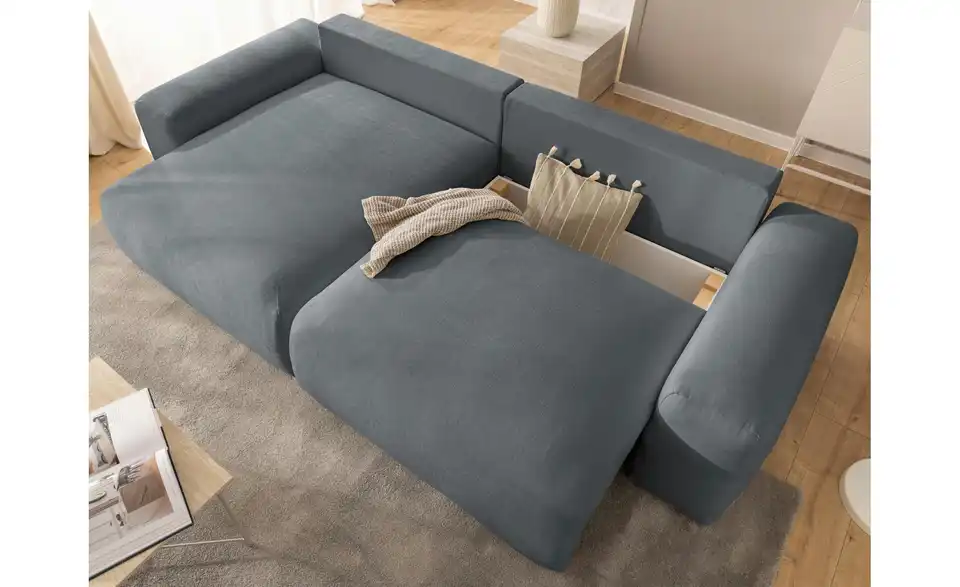 S-STYLE Ecksofa Puffy mit Schlaffunktion, in Wohnsituation