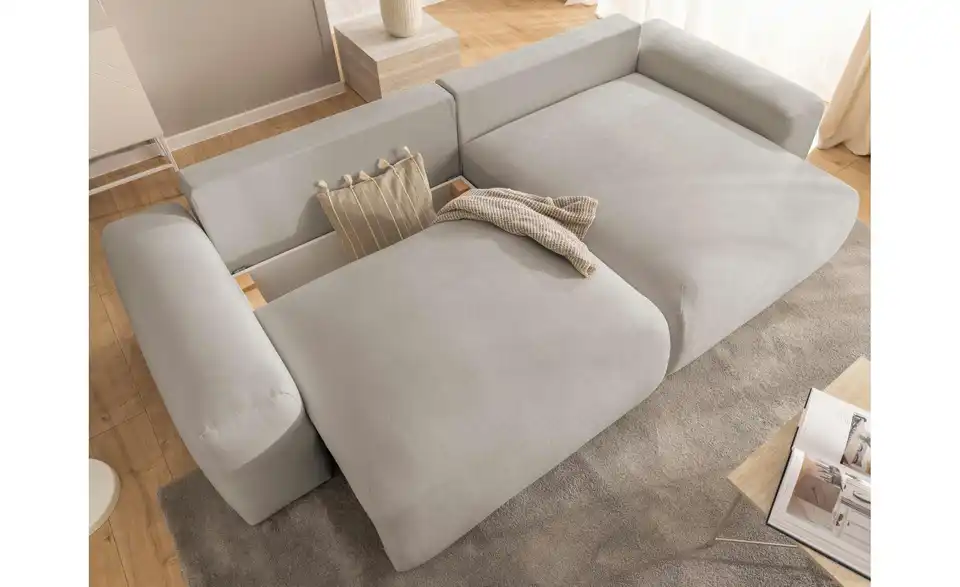 S-STYLE Ecksofa Puffy mit Schlaffunktion, in Wohnsituation